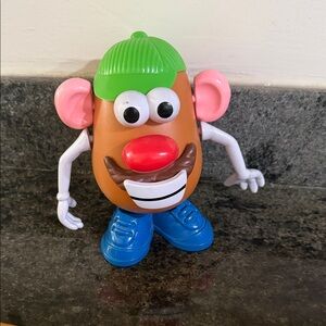 Hasbro Mr. Potato Head Figure with Green Hat, Blue Shoes, Pink Ears, Red Nose